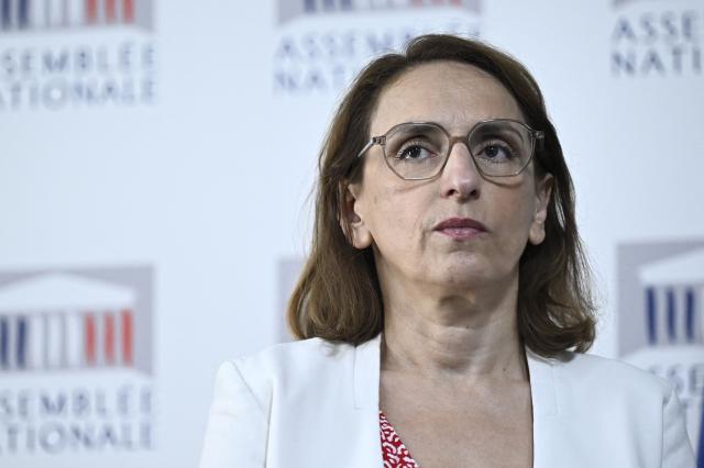 Commission's president Fatiha Keloua Hachi gives a press conference to present the report of the parliamentary commission on violence in schools at the National Assembly in Paris, on  July 2, 2025. The commission of inquiry was born out of the scandal surrounding the revelations of decades of sexual and physical abuse at the Notre-Dame de Betharram school. (Photo by JULIEN DE ROSA / AFP)
