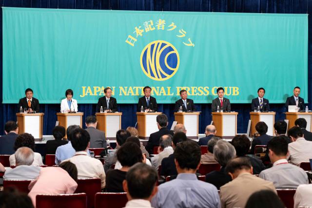 (LR) Leaders of eight political parties, Sanseito Secretary General Sohei Kamiya, Japanese Communist Party Chairperson Tomoko Tamura, Komeito Chief Representative Tetsuo Saito, Democratic Party of Japan President Yoshihiko Noda, Japan's Prime Minister and Liberal Democratic Party President Shigeru Ishiba, Governor of Osaka and Japan Innovation Party Co-Representative Hirofumi Yoshimura, Democratic Party For the People Representative Yuichiro Tamaki and Reiwa Shinsengumi President Taro Yamamoto take part in a debate at the Japan National Press Club in Tokyo on July 2, 2025. (Photo by Tomohiro Ohsumi / POOL / AFP)