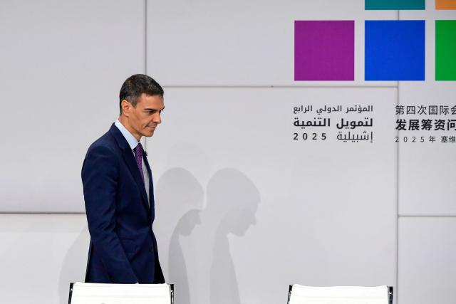 Spain's Prime Minister Pedro Sanchez arrvies for a press briefing on the Seville Platform for Action (SPA) initiative launched during the United Nations 4th International Conference on Financing and Development in Seville, on July 2, 2025. More than 100 nations attending a UN aid conference pledged this week to help defuse the ticking time bomb of developing countries' ballooning debt, but deciding how is proving more divisive. (Photo by CRISTINA QUICLER / AFP)