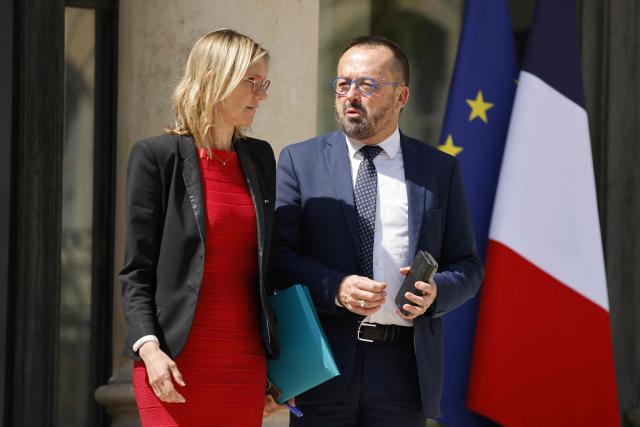 France's Minister of Minister of Ecological Transition, Biodiversity, Forest, Sea and Fisheries Agnes Pannier-Runacher (L) and France's Minister in charge of Health and Access to Care Yannick Neuder leave after the weekly cabinet meeting at the Elysee palace in Paris, on July 2, 2025. (Photo by Ludovic MARIN / AFP)