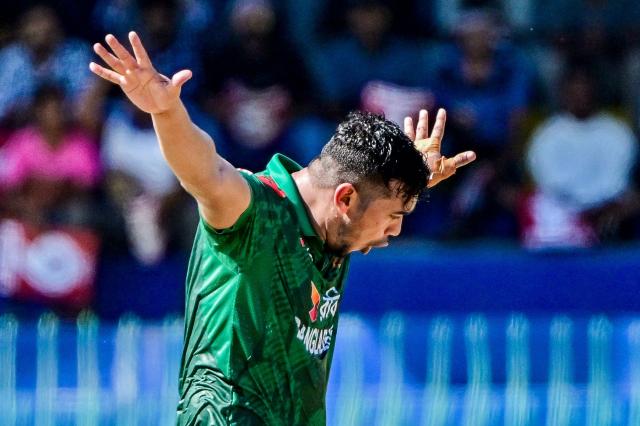 Bangladesh's Taskin Ahmed celebrates after taking the wicket of Sri Lanka's Kamindu Mendis during the first one-day international (ODI) cricket match between Sri Lanka and Bangladesh at the R. Premadasa International Cricket Stadium in Colombo on July 2, 2025. (Photo by Ishara S. KODIKARA / AFP)