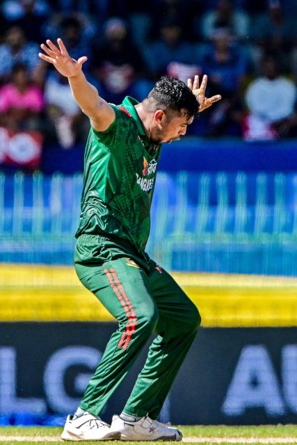 Bangladesh's Taskin Ahmed celebrates after taking the wicket of Sri Lanka's Kamindu Mendis during the first one-day international (ODI) cricket match between Sri Lanka and Bangladesh at the R. Premadasa International Cricket Stadium in Colombo on July 2, 2025. (Photo by Ishara S. KODIKARA / AFP)