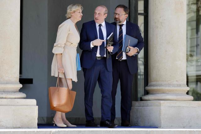 France's Delegate Minister for Tourism Economy Nathalie Delattre (L), France's Minister of Public Action, Civil Service and Simplification Laurent Marcangeli and France's Delegate Minister for Relations with Parliament Patrick Mignola leave after the weekly cabinet meeting at the Elysee palace in Paris, on July 2, 2025. (Photo by Ludovic MARIN / AFP)