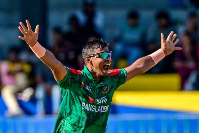 Bangladesh's Tanvir Islam celebrates after taking the wicket of Sri Lanka's Kusal Mendis during the first one-day international (ODI) cricket match between Sri Lanka and Bangladesh at the R. Premadasa International Cricket Stadium in Colombo on July 2, 2025. (Photo by Ishara S. KODIKARA / AFP)