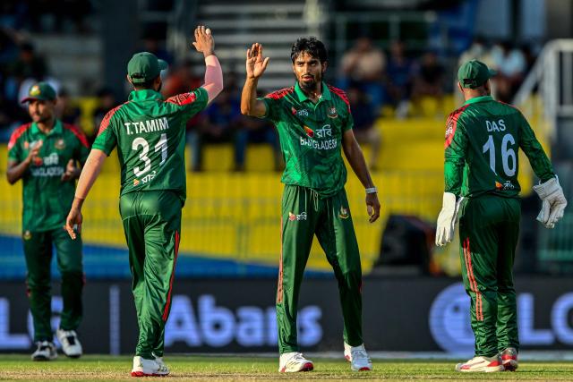 Bangladesh's Tanzim Hasan Sakib (C) celebrates with teammates after taking the wicket of Sri Lanka's Milan Rathnayake during the first one-day international (ODI) cricket match between Sri Lanka and Bangladesh at the R. Premadasa International Cricket Stadium in Colombo on July 2, 2025. (Photo by Ishara S. KODIKARA / AFP)