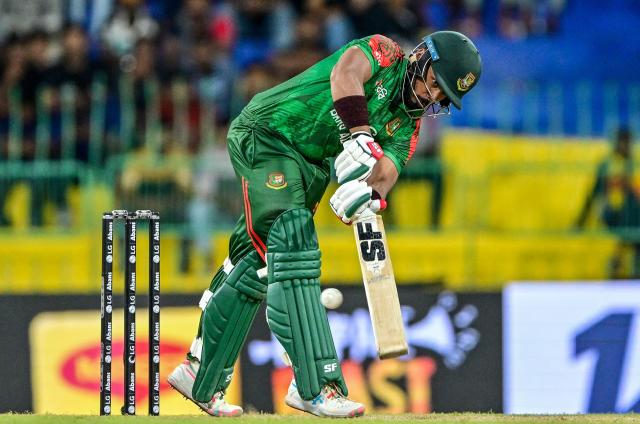 Bangladesh's Parvez Hossain Emon plays a shot during the first one-day international (ODI) cricket match between Sri Lanka and Bangladesh at the R. Premadasa International Cricket Stadium in Colombo on July 2, 2025. (Photo by Ishara S. KODIKARA / AFP)