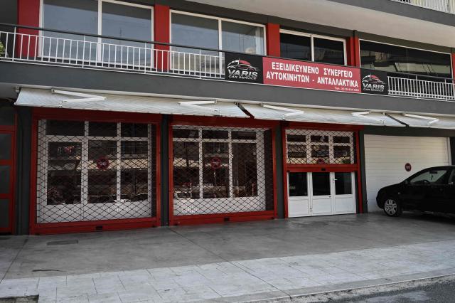 A car repair shop is closed during a strike in Thessaloniki on July 2, 2025. Car repair shops, car washes, parking facilities, and vehicle rental businesses across Greece have begun rolling 24-hour strikes in protest against the compulsory implementation of a new digital customer registry, which came into effect on July 1. (Photo by Sakis Mitrolidis / AFP)