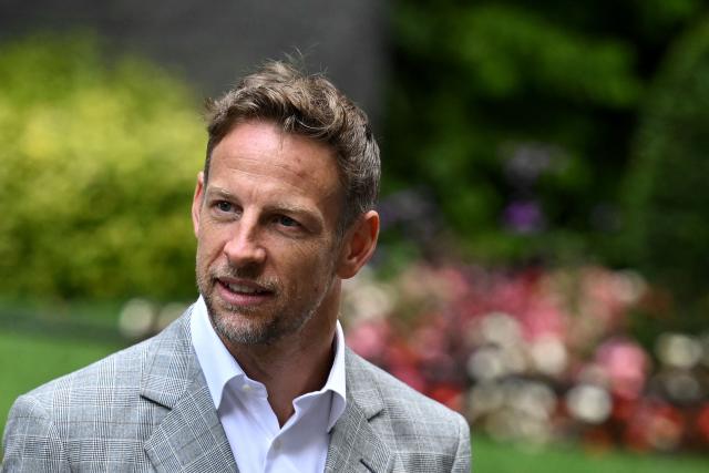 Former British F1 driver Jenson Button arrives to attend a reception to celebrate 75 years of Formula 1 hosted by Britain's Prime Minister Keir Starmer at 10 Downing Street, in central London on July 2, 2025. (Photo by Ben STANSALL / AFP)