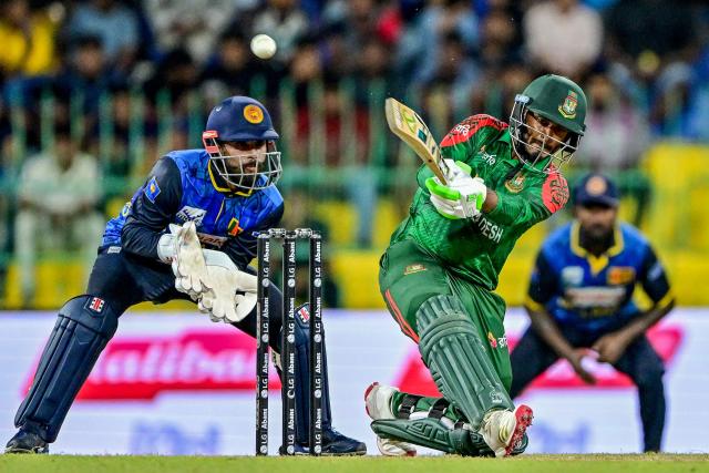 Bangladesh's Tanzid Hasan (R) plays a shot during the first one-day international (ODI) cricket match between Sri Lanka and Bangladesh at the R. Premadasa International Cricket Stadium in Colombo on July 2, 2025. (Photo by Ishara S. KODIKARA / AFP)