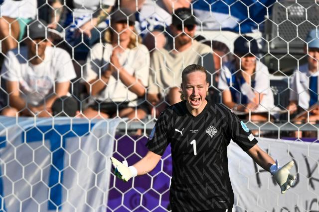 Iceland's goalkeeper #01 Cecilia Runarsdottir gives instructions to her teammates during the UEFA Women's Euro 2025 Group A football match between Iceland and Finland at the Arena Thun stadium in Thun on July 2, 2025.  (Photo by Fabrice COFFRINI / AFP)