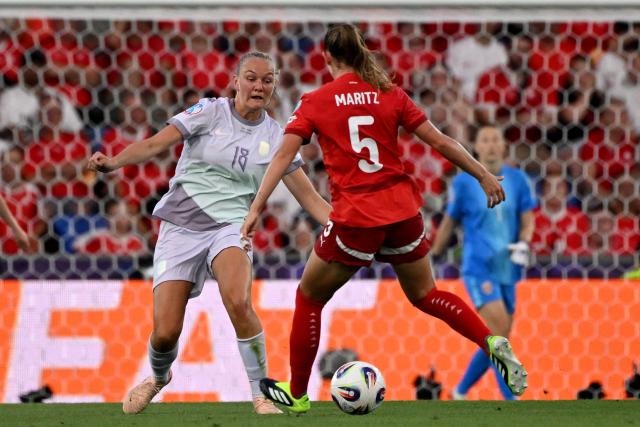 Norway's defender #06 Maren Mjelde and Norway's midfielder #18 Frida Maanum fight for the ball during the UEFA Women's Euro 2025 Group A football match between Switzerland and Norway at the St Jakob-Park Stadium in Basel on July 2, 2025. (Photo by Miguel MEDINA / AFP)