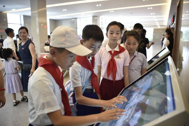 Domestic tourists arrive at Wonsan Kalma Coastal Tourist Area in Wonsan, North Korea's Kangwon Province on July 1, 2025. North Korea opened a massive resort area on its east coast, state media said on July 2, with the tourism pet project of leader Kim Jong Un reportedly set to welcome Russian guests later this month. (Photo by KIM Won Jin / AFP)
