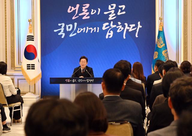 South Korean President Lee Jae Myung delivers a speech during a press conference to mark his first 30 days in office at the Blue House in Seoul on July 3, 2025. (Photo by KIM Min-Hee / POOL / AFP)