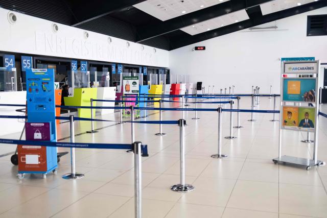 This photograph shows an empty the hall at the regional terminal during a control operation against drug trafficking at the Maryse Conde airport, in Les Abymes, on the French Caribbean island of Guadeloupe on July 2, 2025. (Photo by Carla Bernhardt / AFP)