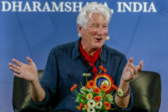 US actor Richard Gere addresses a gathering during the International Tibet Youth Forum in Dharamsala on July 3, 2025. The Dalai Lama said on July 2 that the 600-year-old Tibetan spiritual institution would continue after his death, reassuring Buddhist followers around the globe and saying his office "exclusively" would name his successor, even as China insisted it would. (Photo by Niharika KULKARNI / AFP)