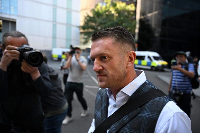 British far-right activist Tommy Robinson, whose real name is Stephen Yaxley-Lennon, arrives outside Southwark Crown court on July 3, 2025, charged with "harassment" of two journalists. (Photo by JUSTIN TALLIS / AFP)