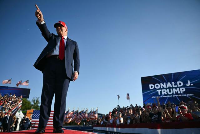 US President Donald Trump gestures as he steps on stage to deliver remarks at the Salute to America Celebration at the Iowa State Fairgrounds in Des Moines on July 3, 2025. (Photo by ANDREW CABALLERO-REYNOLDS / AFP)