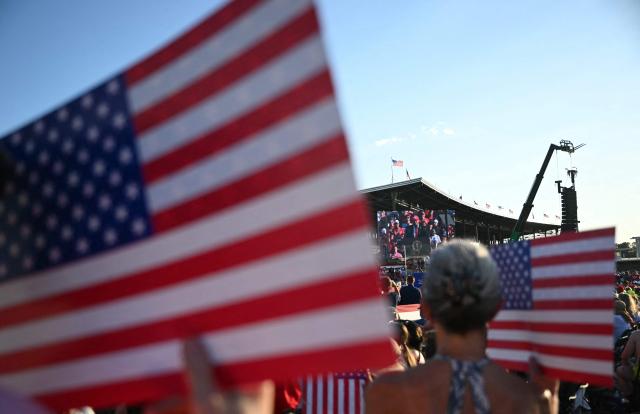 Supporters listen to US President Donald Trump’s address during the Salute to America celebration at the Iowa State Fairgrounds in Des Moines on July 3, 2025. (Photo by ANDREW CABALLERO-REYNOLDS / AFP)