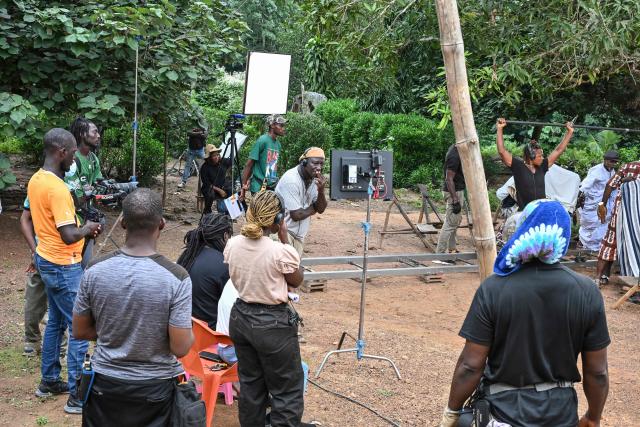 A general view of the film set of "Le Testament", directed by Burkina's Adama Rouamba, in a village near Agboville on June 27, 2025. In the shadow of Nigeria's towering Nollywood and its prolific productions, Ivory Coast has been striving to establish itself as an attractive destination for filmmaking on the African continent. (Photo by Issouf SANOGO / AFP)