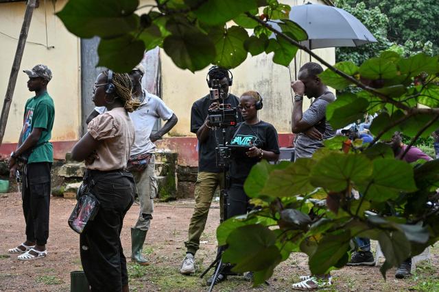 A general view of the film set of "Le Testament", directed by Burkina's Adama Rouamba, in a village near Agboville on June 27, 2025. In the shadow of Nigeria's towering Nollywood and its prolific productions, Ivory Coast has been striving to establish itself as an attractive destination for filmmaking on the African continent. (Photo by Issouf SANOGO / AFP)