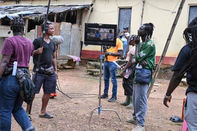 A general view of the film set of "Le Testament", directed by Burkina's Adama Rouamba, in a village near Agboville on June 27, 2025. In the shadow of Nigeria's towering Nollywood and its prolific productions, Ivory Coast has been striving to establish itself as an attractive destination for filmmaking on the African continent. (Photo by Issouf SANOGO / AFP)