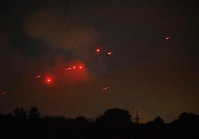 The Ukrainian air defence fires at Russian drones during a night mass strike on Kyiv on July 4, 2025, amid the Russian invasion of Ukraine. (Photo by Sergei SUPINSKY / AFP)