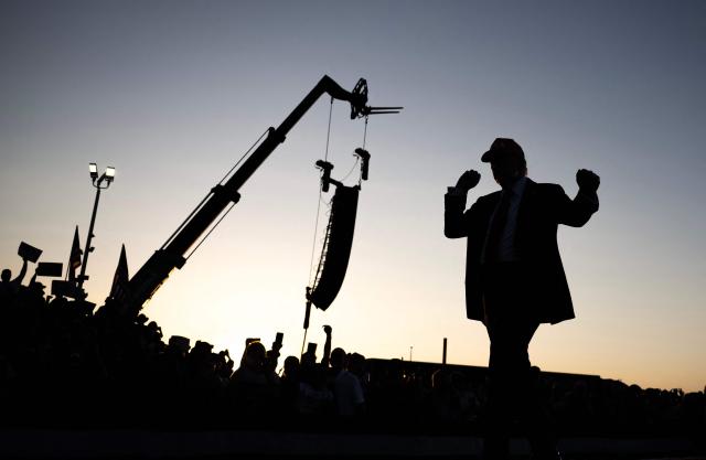 US President Donald Trump dances as he leaves the stage after speaking at the Iowa State fairgrounds in Des Moines, Iowa on July 3, 2025. (Photo by ANDREW CABALLERO-REYNOLDS / AFP)