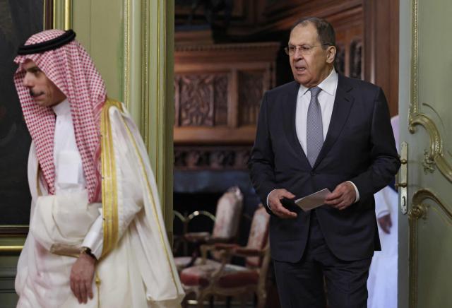 Russia's Foreign Minister Sergei Lavrov and Saudi Arabia's Foreign Minister Prince Faisal bin Farhan Al Saud arrive for a joint press conference following their meeting in Moscow on July 4, 2025. (Photo by Evgenia Novozhenina / POOL / AFP)