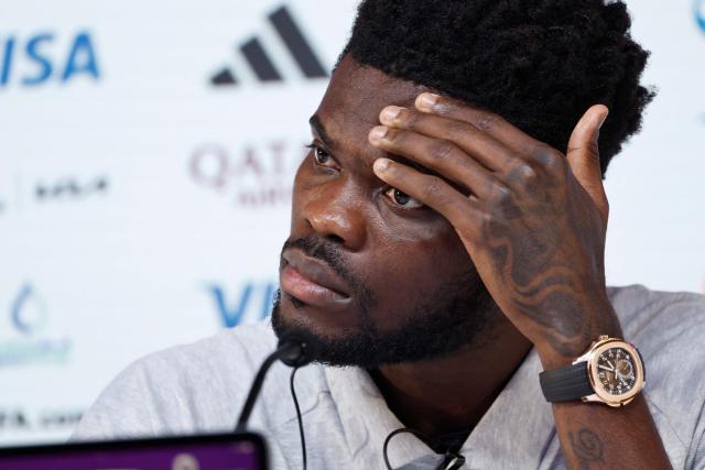 (FILES) Ghana's midfielder #05 Thomas Partey gives a press conference at the Qatar National Convention Center (QNCC) in Doha on December 1, 2022, on the eve of the Qatar 2022 World Cup football match between Ghana and Uruguay. Former Arsenal footballer Thomas Partey was on Friday charged with five counts of rape and one count of sexual assault after complaints by three women, UK police said on July 4, 2025. The charges against the 32-year-old Ghana international relate to alleged offences that took place between 2021 and 2022, the Metropolitan Police force said in a statement. (Photo by Khaled DESOUKI / AFP)