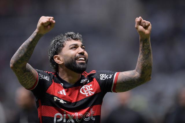 (FILES) Flamengo's forward #99 Gabriel Barbosa celebrates winning the Brazil Cup final second leg football match between Atletico Mineiro and Flamengo at the MRV Arena Stadium in Belo Horizonte, Brazil, on November 10, 2024. Gabriel Barbosa, aka Gabigol, was acquitted on July 4, 2025 of an accusation of attempted fraud in a doping test in 2023, the Court of Arbitration for Sport (CAS) reported. (Photo by DOUGLAS MAGNO / AFP)