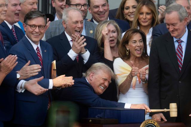 US President Donald Trump bangs a gavel after signing his signature bill of tax breaks and spending cuts "Big Beautiful Bill" on the South Lawn of the White House in Washington, DC, on July 4, 2025. US President Donald Trump will sign his flagship tax and spending bill on July 4 in a pomp-laden Independence Day ceremony featuring fireworks and a flypast by the type of stealth bomber that bombed Iran.
Trump pushed Republican lawmakers to get his unpopular "One Big Beautiful Bill" through a reluctant Congress in time for him to sign it into law on the US national holiday -- and they did so with a day to spare Thursday. (Photo by Jim WATSON / AFP)