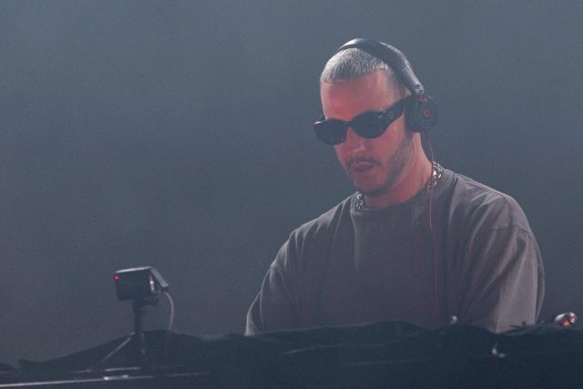 French DJ and producer DJ Snake performs on stage during the 35th edition of the "Eurockeennes de Belfort" music festival in Sermamagny, eastern France, on July 4, 2025. (Photo by ROMEO BOETZLE / AFP)
