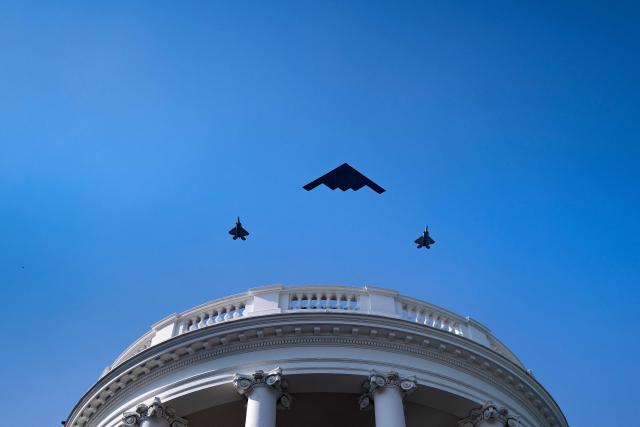 A B-2 Spirit stealth bomber escorted by 2 F-35 Lightning II stealth fighters fly over the White House as US president Donald Trump and First Lady Melania Trump participate in the Military Family Picnic on the South Lawn of the White House in Washington, DC on July 4, 2025. (Photo by Brendan Smialowski / AFP)