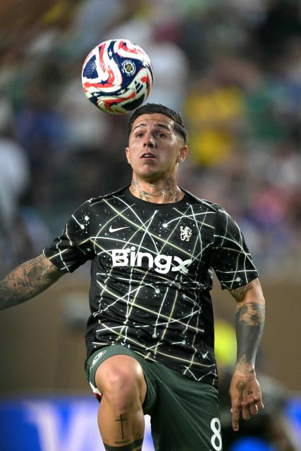 Chelsea's Argentinian midfielder #08 Enzo Fernandez warms up ahead of the FIFA Club World Cup 2025 quarterfinal football match between Brazil's Palmeiras and England's Chelsea at the Lincoln Financial Field Stadium in Philadelphia on July 4, 2025. (Photo by Juan MABROMATA / AFP)