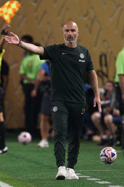 Chelsea's Italian head coach Enzo Maresca gestures during the FIFA Club World Cup 2025 quarterfinal football match between Brazil's Palmeiras and England's Chelsea at the Lincoln Financial Field Stadium in Philadelphia on July 4, 2025. (Photo by FRANCK FIFE / AFP)