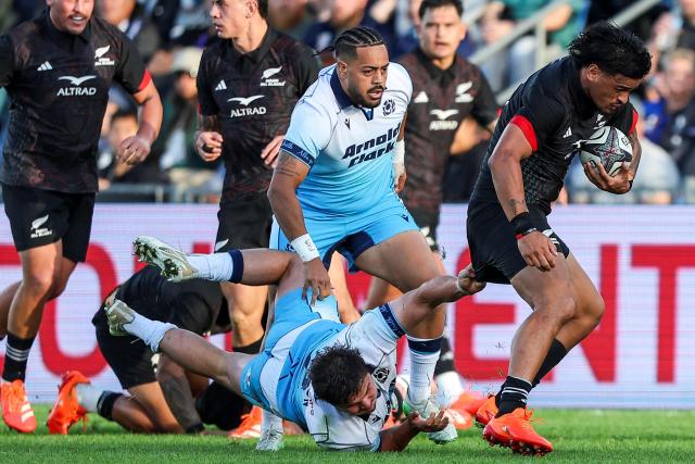 New Zealand Maori's Bailyn Sullivan (R) gets tackled by Scotlands Patrick Harrison (L) during their rugby match between New Zealand Maori and Scotland at Semenoff Stadium in Whangarei on July 5, 2025. (Photo by DJ Mills / AFP)