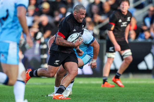 New Zealand Maori's Jared Proffit runs the ball during their rugby match between New Zealand Maori and Scotland at Semenoff Stadium in Whangarei on July 5, 2025. (Photo by DJ Mills / AFP)