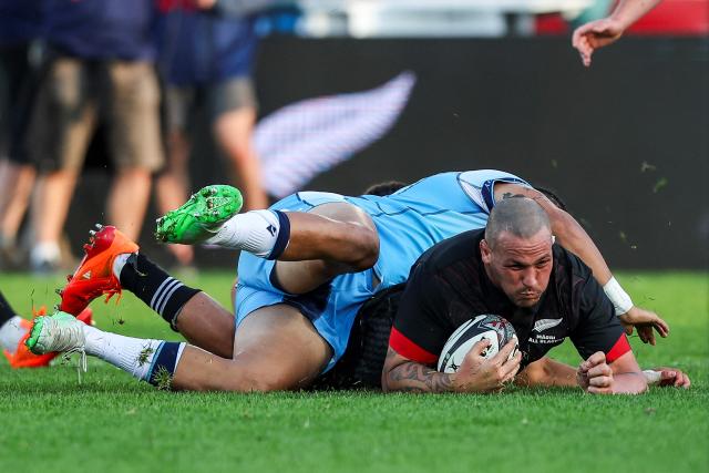 TOPSHOT - New Zealand Maori's Isaia Walker-Leawere scores a try during their rugby match between New Zealand Maori and Scotland at Semenoff Stadium in Whangarei on July 5, 2025. (Photo by DJ Mills / AFP)