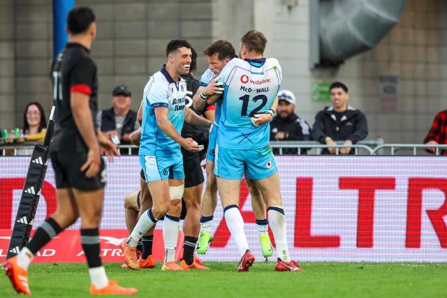 Scotland's players celebrate a try during their rugby match between New Zealand Maori and Scotland at Semenoff Stadium in Whangarei on July 5, 2025. (Photo by DJ Mills / AFP)