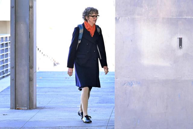 Crown Prosecutor Nanette Rogers arrives at the Latrobe Valley Law Courts in Morwell on July 5, 2025. Jury members retired on June 30 to decide the fate of an Australian woman accused of murdering three members of her husband's family with a toxic mushroom-laced beef Wellington lunch. Jurors began deliberating their verdict on 50-year-old home cook Erin Patterson after a nine-week trial. (Photo by William WEST / AFP)