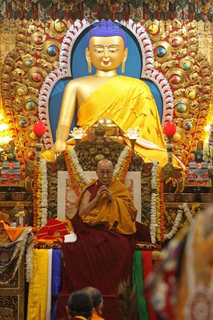 Tibetan spiritual leader the Dalai Lama attends a long-life prayer offering ceremony at the Main Tibetan Temple in McLeod Ganj, near Dharamsala on July 5, 2025. The Dalai Lama said on July 5 he dreamed of living for decades more, as the Buddhist spiritual leader prayed with thousands of exiled Tibetans on the eve of his 90th birthday. (Photo by Sanjay BAID / AFP)