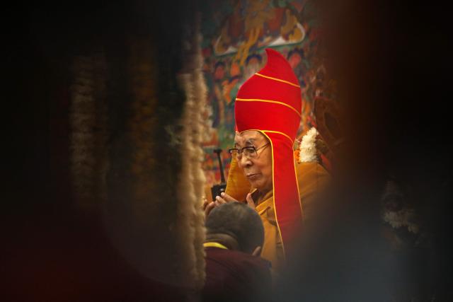 Tibetan spiritual leader the Dalai Lama attends a long-life prayer offering ceremony at the Main Tibetan Temple in McLeod Ganj, near Dharamsala on July 5, 2025. The Dalai Lama said on July 5 he dreamed of living for decades more, as the Buddhist spiritual leader prayed with thousands of exiled Tibetans on the eve of his 90th birthday. (Photo by Sanjay BAID / AFP)