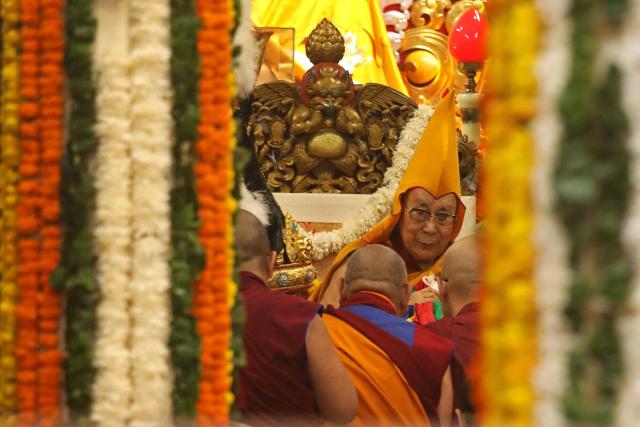 Tibetan spiritual leader the Dalai Lama attends a long-life prayer offering ceremony at the Main Tibetan Temple in McLeod Ganj, near Dharamsala on July 5, 2025. The Dalai Lama said on July 5 he dreamed of living for decades more, as the Buddhist spiritual leader prayed with thousands of exiled Tibetans on the eve of his 90th birthday. (Photo by Sanjay BAID / AFP)