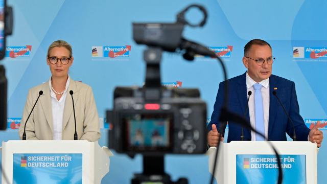 Co-leaders of the far-right Alternative for Germany (AfD) party Tino Chrupalla (R) and Alice Weidel address a press conference after a meeting of the AfD parliamentary group in Berlin on July 5, 2025. (Photo by John MACDOUGALL / AFP)