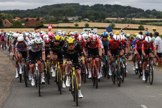 Team Visma - Lease a bike team's US rider Matteo Jorgenson cycles ahead of the pack of riders (peloton) during the 1st stage of the 112th edition of the Tour de France cycling race, 184.9 km starting and finishing in Lille Metropole, northern France, on July 5, 2025. (Photo by Anne-Christine POUJOULAT / AFP)