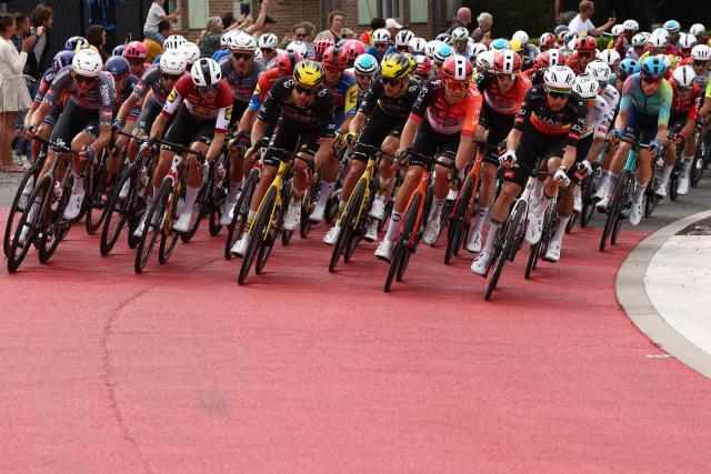The pack of riders (peloton) cycles during the 1st stage of the 112th edition of the Tour de France cycling race, 184.9 km starting and finishing in Lille Metropole, northern France, on July 5, 2025. (Photo by Anne-Christine POUJOULAT / AFP)