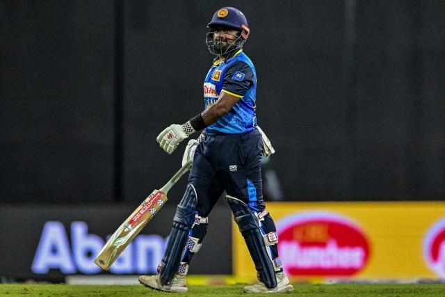 Sri Lanka's captain Charith Asalanka walks back to the pavilion after his dismissal during the second one-day international (ODI) cricket match between Sri Lanka and Bangladesh at the R. Premadasa International Cricket Stadium in Colombo on July 5, 2025. (Photo by Ishara S. KODIKARA / AFP)