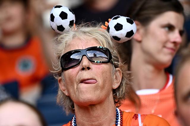 A supporter reacts before the start of the UEFA Women's Euro 2025 Group D football match between Wales and The Netherlands at the Allmend Stadion Luzern in Lucerne on July 5, 2025. (Photo by Fabrice COFFRINI / AFP)