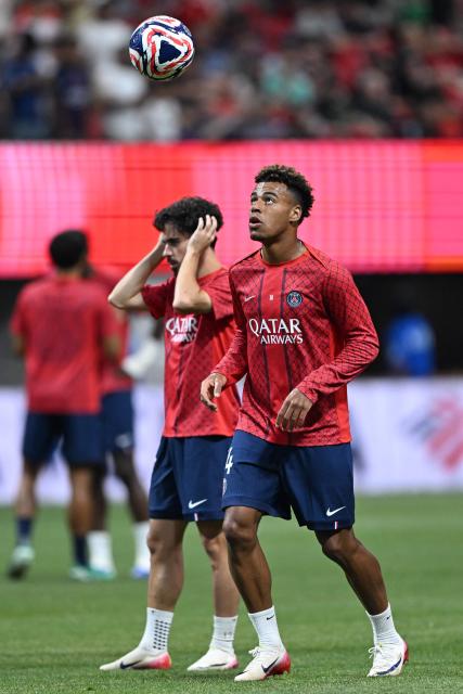 Paris Saint-Germain's French midfielder #14 Desire Doue controls the ball during the warmup before the FIFA Club World Cup 2025 quarterfinal football match between France's Paris Saint-Germain and Germany's Bayern Munich at the Mercedes-Benz Stadium in Atlanta on July 5, 2025. (Photo by PATRICIA DE MELO MOREIRA / AFP)