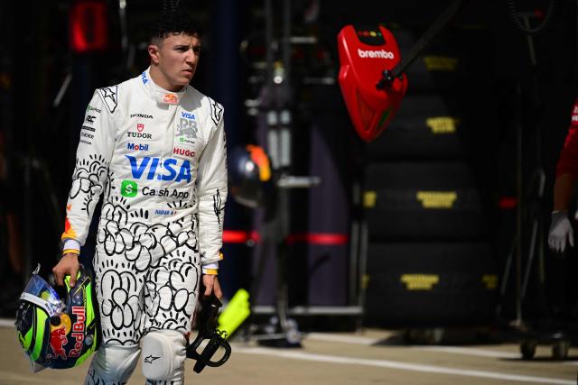 RB's French driver Isack Hadjar walks back during the qualifying session ahead of the Formula One British Grand Prix at the Silverstone motor racing circuit in Silverstone, central England, on July 5, 2025. (Photo by Ben STANSALL / POOL / AFP)
